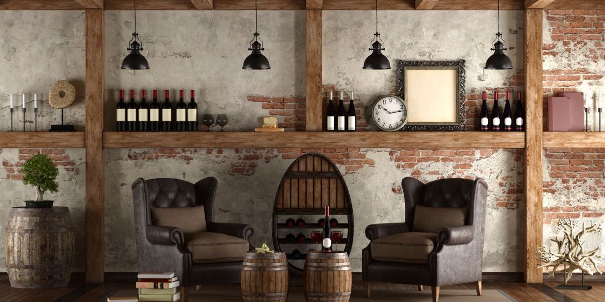 Zwei gemütliche, grosse Ledersessel mit davor stehenden kleinen Weinfässern als Tisch laden ein, auf ein gemütliches Glas Wein